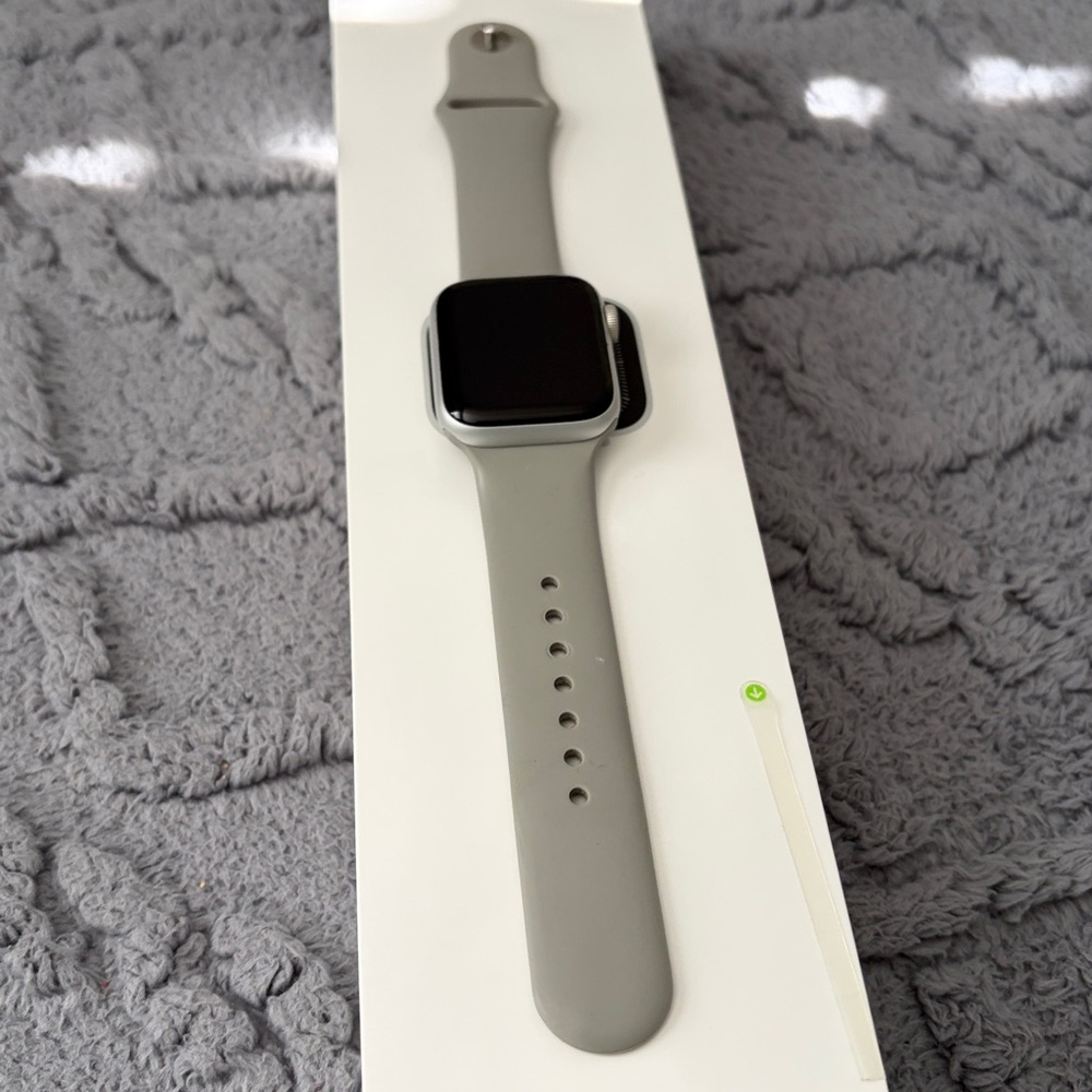 Apple watch s5 working perfectly w band and charger. Tiny dent on left top frame